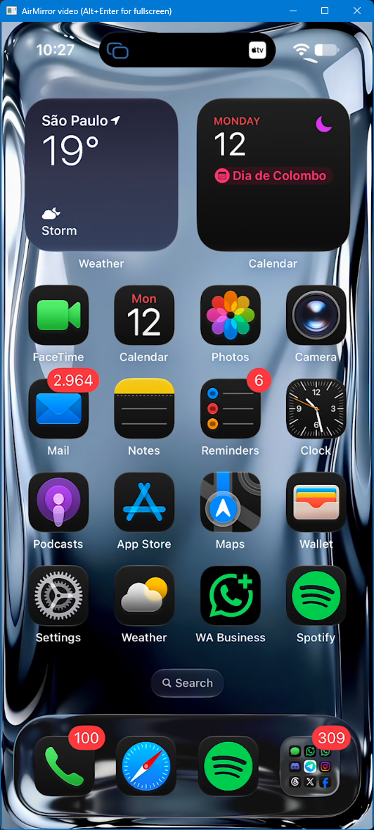 AirMirror video window displaying a mirrored iPhone Home Screen on Windows